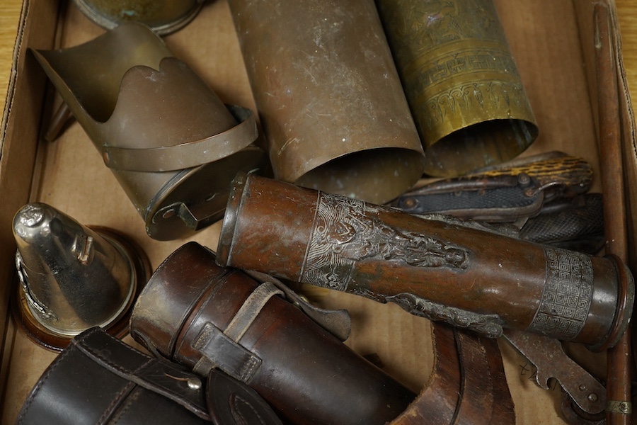 A collection of First World War trench art including engraved shell cases, mounted bullets in the form of a table lighter, ashtrays, etc. three penknives, a broken swagger stick, etc. Condition - poor to fair.